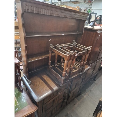 1020 - An oak dresser together with an oak nest of tables.