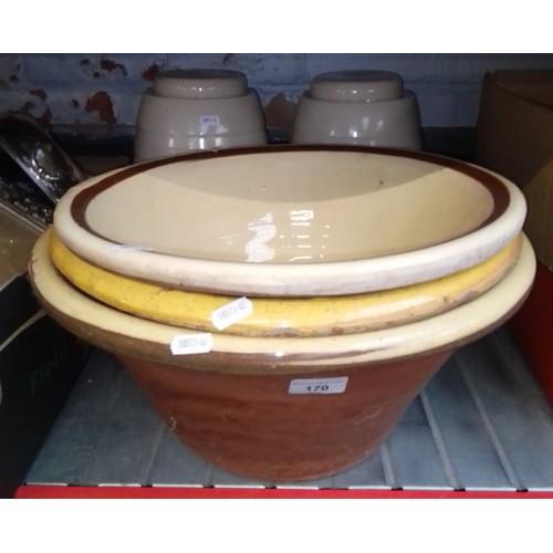 170 - Three earthenware bowls and two ceramic barrels.