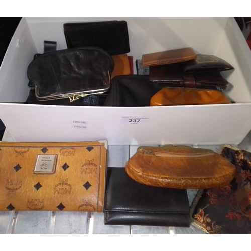 237 - A box of leather purses.