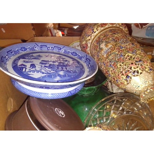 233 - A box of various ceramics & glass items to include blue and white & a brass hand bell etc.