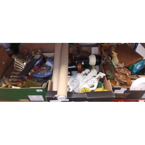 244 - Three boxes of mixed items including hunting knife, Staffordshire figure, Goebel figures, brass fire... 