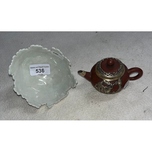 536 - A Chinese white metal mounted miniature Yixing red clay teapot and cover, seal mark to base, length ... 