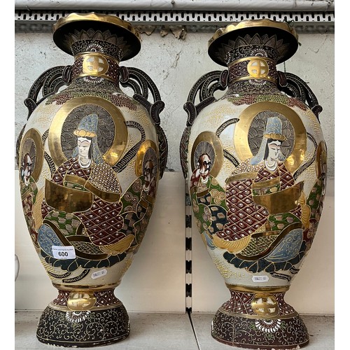 600 - A pair of Japanese vases, height 54cm.