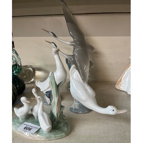 606 - Figurines by Nao - ‘Flying Herons’ 28cm high and three others of geese