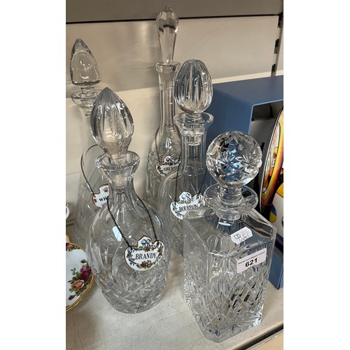 621 - 5 lead crystal decanters including one by Tyrone Crystal, Ireland, together with 4 ceramic decanter ... 