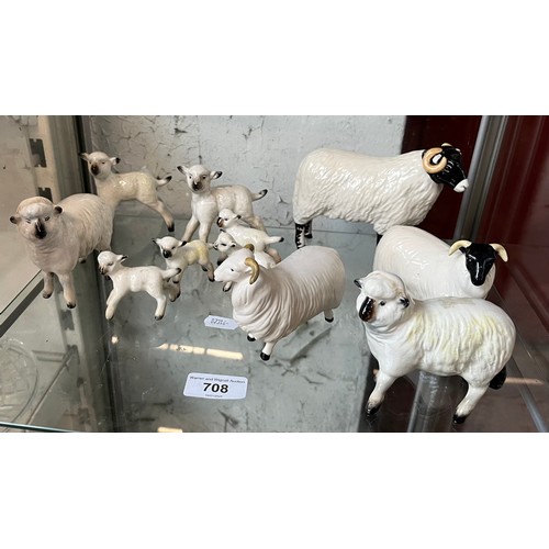 708 - A group of 11 Beswick sheep and lamb figures, various sizes, including one with matt finish