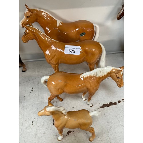 679 - Four light brown Beswick horses and foals