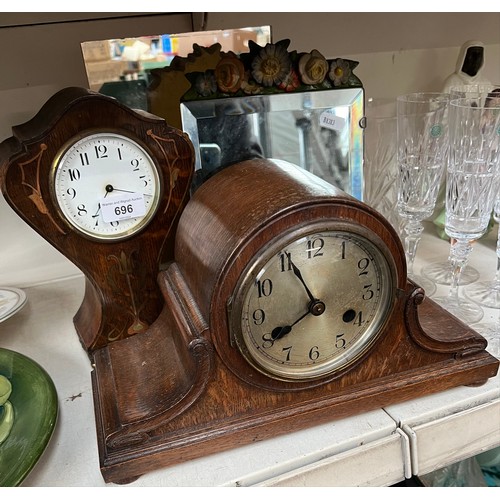 696 - Art Nouveau clock, An Oak cased mantel Clock with key and Pendulum and two mirrors