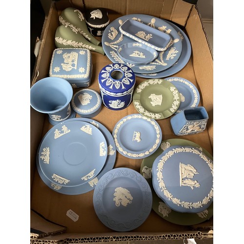 748 - A box of Wedgwood jasperware including hair tidy, etc. Pale blue, dark blue, black and green. 20 pie... 