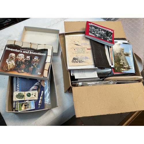 782 - A box of postcards and a box of cigarette/tea cards and albums