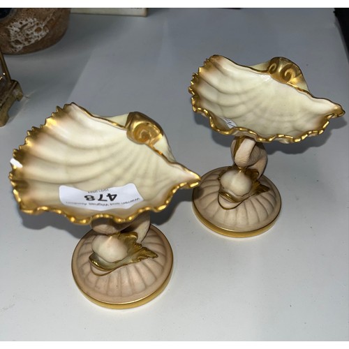 478 - A pair of blush ivory Worcester scallop shell table salts, height appx 11cm