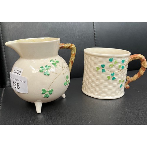 488 - 2 pieces of Belleek china - a mug and a jug, both with black back stamps