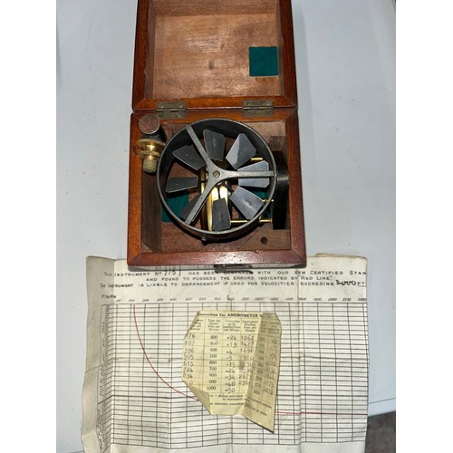 473 - A cased anemometer, number 7157, with standard comparisons sheet and correction sheet