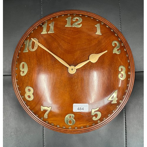 484 - A mahogany convex wall clock with brass numerals, Heal's London, Rd number 687088, with replaced mov... 