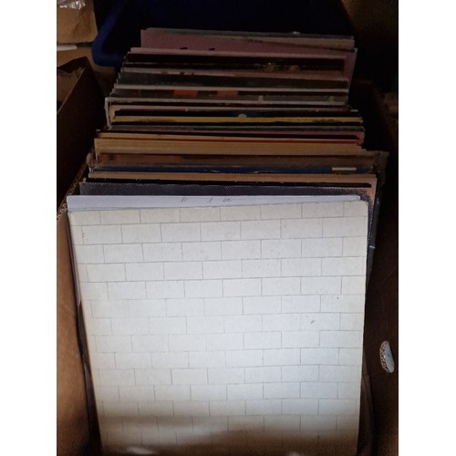 268 - A box of vinyl LP records, various artists and genres, including Pink Floyd 'The Wall'.