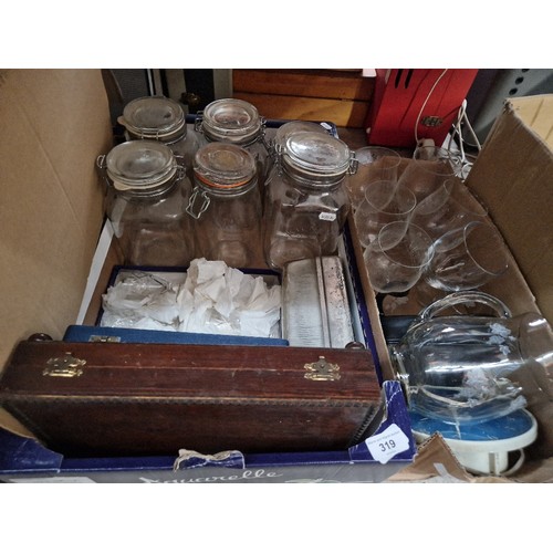 319 - A mixed lot comprising Kilner jars, cutlery sets, glassware, binoculars & a bulkhead light.