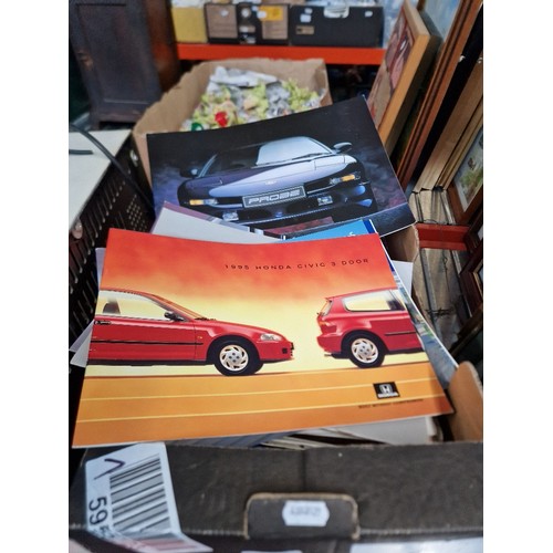 332 - A box of various car sales brochures.