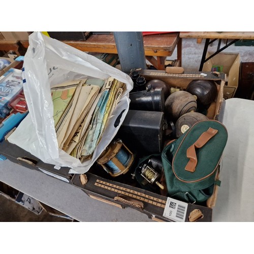 370 - A box of various items including binoculars, bowls, sea fishing reel, a fly fishing reel and a bag o... 