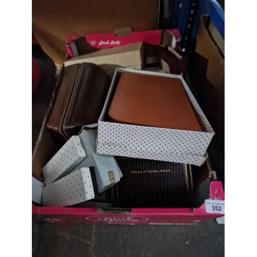 352 - A box of assorted items, personal grooming kits, address books, 2 Parker pens, etc.