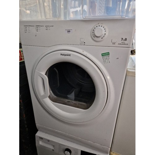 389 - A Hotpoint Aquarius tumble dryer.