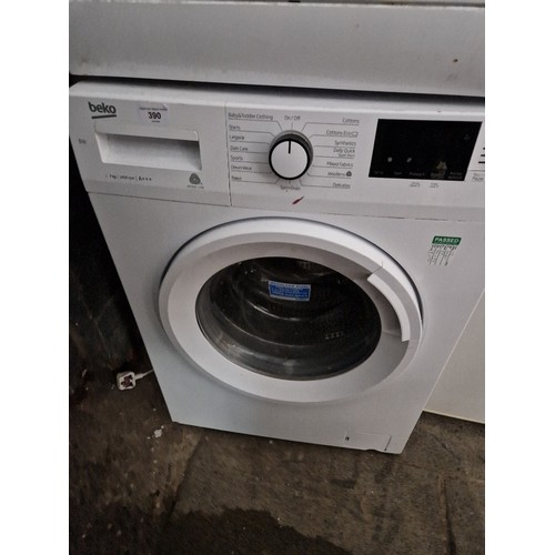 390 - A Beko washing machine.