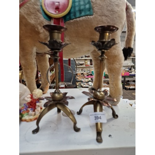 394 - A pair of Arts & Crafts copper and brass candlesticks in the manner of WAS Benson, height 23cm.