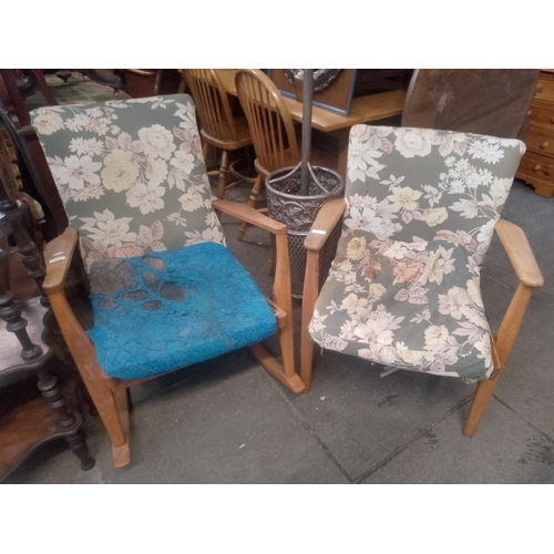 1032 - A mid 20th century Parker Knoll rocking chair and a Parker Knoll armchair.