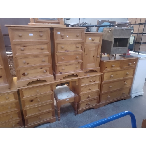 1047 - Various items of pine furniture; dressing table with mirror and stool, chest of drawers, pair of bed... 