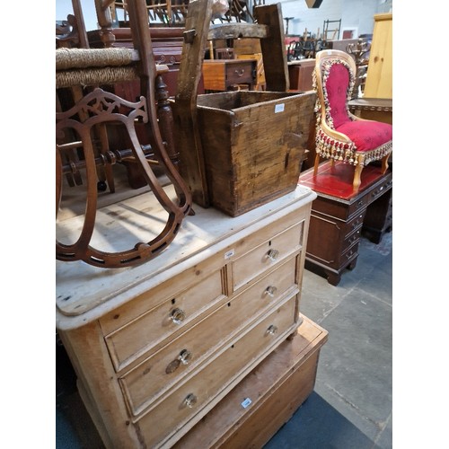 1054 - A Victorian pine chest of drawers with pressed glass handles together with a rustic wooden bucket.