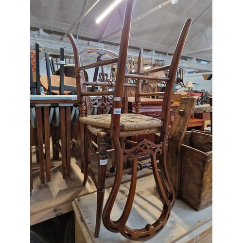 1053 - A pair of walnut bedroom chairs, circa 1900.