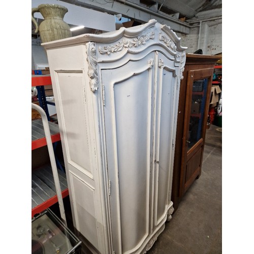 1058 - A French white painted armoire.