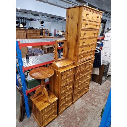 1057 - Various items of pine furniture; two chests of drawers, tallboy chest of drawers, side table, mirror... 