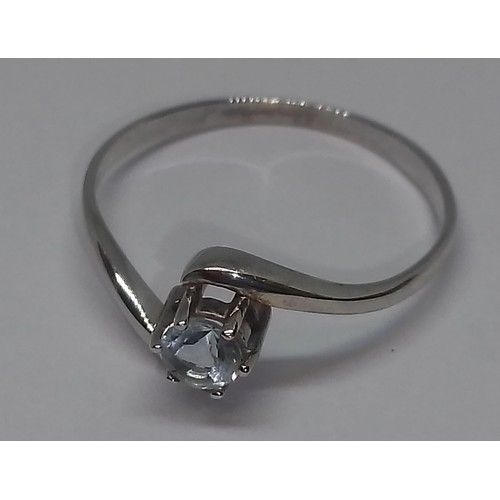 430 - An aquamarine solitaire ring, white metal unmarked, gross weight 1.4g, size P.