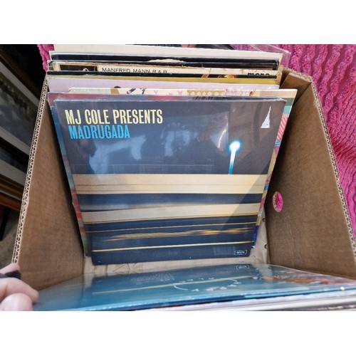 268 - A box of vinyl LP records, various artists and genres, including Pink Floyd 'The Wall'.