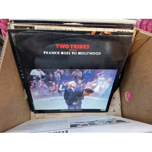 268 - A box of vinyl LP records, various artists and genres, including Pink Floyd 'The Wall'.