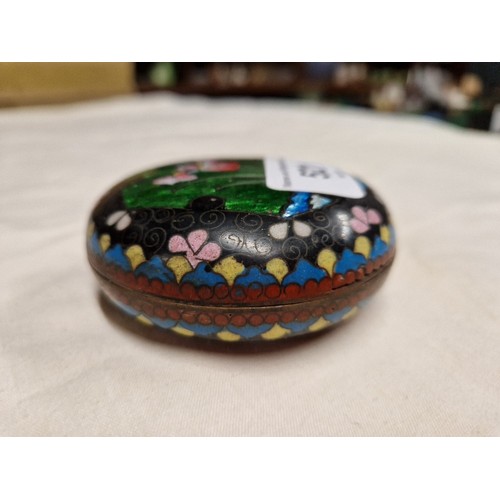 521 - A cloisonne bowl and a cloisonne lidded dish.