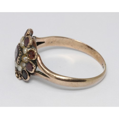 2 - A 19th century garnet and split pearl cluster ring, unmarked, gross weight 2.5g, size P.