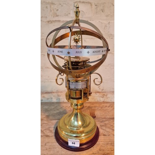 44 - A reproduction orrery clock, attributed to St James House Company London, unmarked, height 41cm.