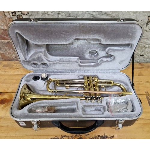 275 - An Odysey trumpet in hard case.