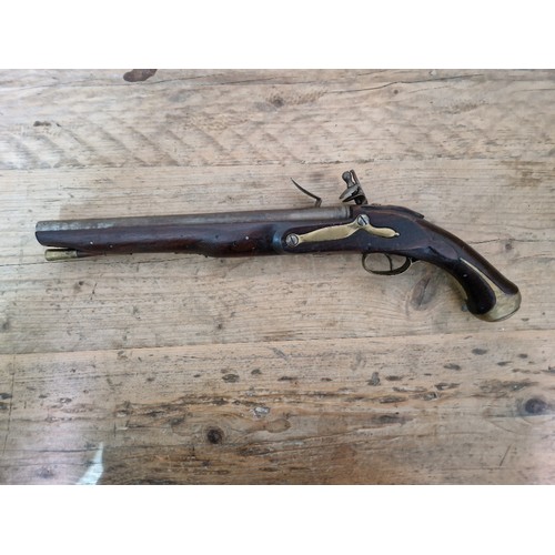 116 - A pair of reproduction flintlock pistols, 31cm barrel with ramrod below, touch hole is just an inden... 