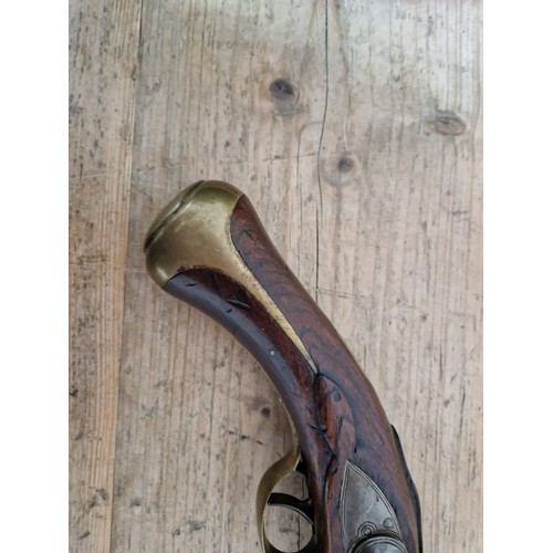 116 - A pair of reproduction flintlock pistols, 31cm barrel with ramrod below, touch hole is just an inden... 