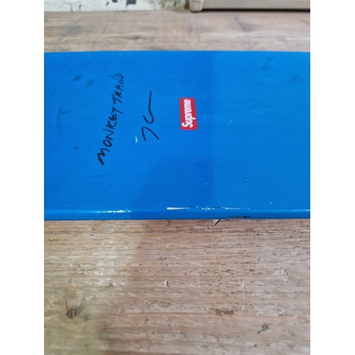 238 - A Supreme skateboard deck, 