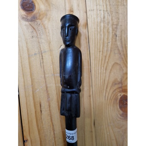 268 - A group of 4 sticks to include an African carved ebony stick, a swagger stick marked EGYPT 44 & 2  w... 