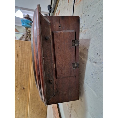 235 - A mahogany cased round fusee wall clock, signed 'Kimich Hemel Hempstead', diameter 41cm.