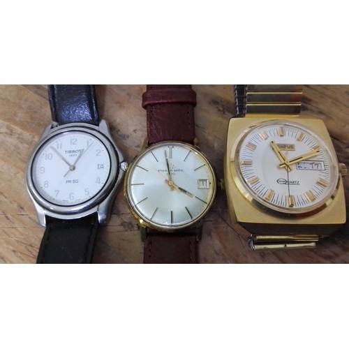 67 - Three watches: A Eiko Eterna-Matic 1000, a Tissot and a Benrus.