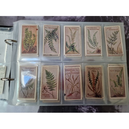 307 - Five albums of mainly assorted cigarette cards.