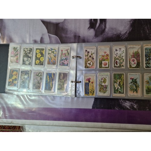 307 - Five albums of mainly assorted cigarette cards.