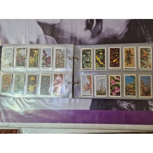 307 - Five albums of mainly assorted cigarette cards.