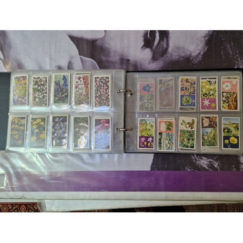 307 - Five albums of mainly assorted cigarette cards.