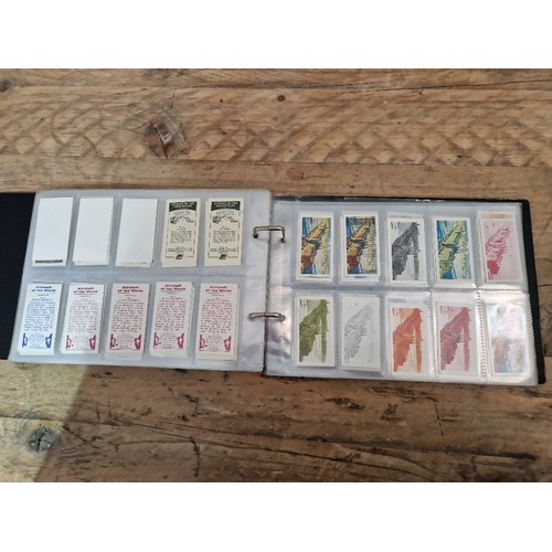 307 - Five albums of mainly assorted cigarette cards.